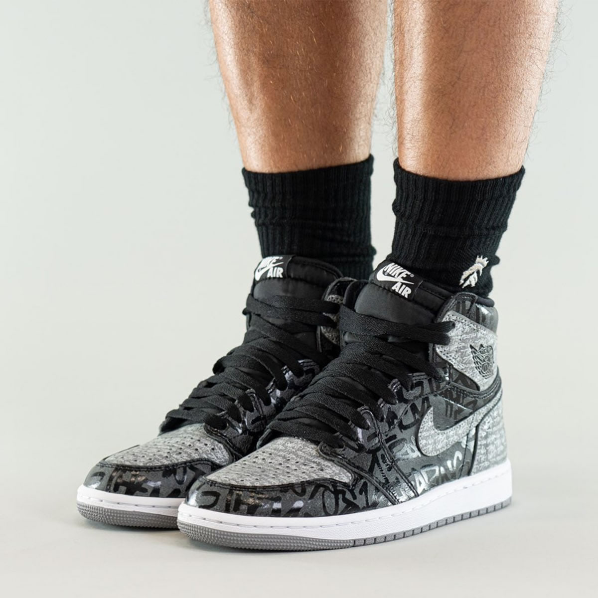 Air Jordan 1 High Og Rebellionaire Black White Particle Grey On Feet 555088 036 (1) - www.newkick.org